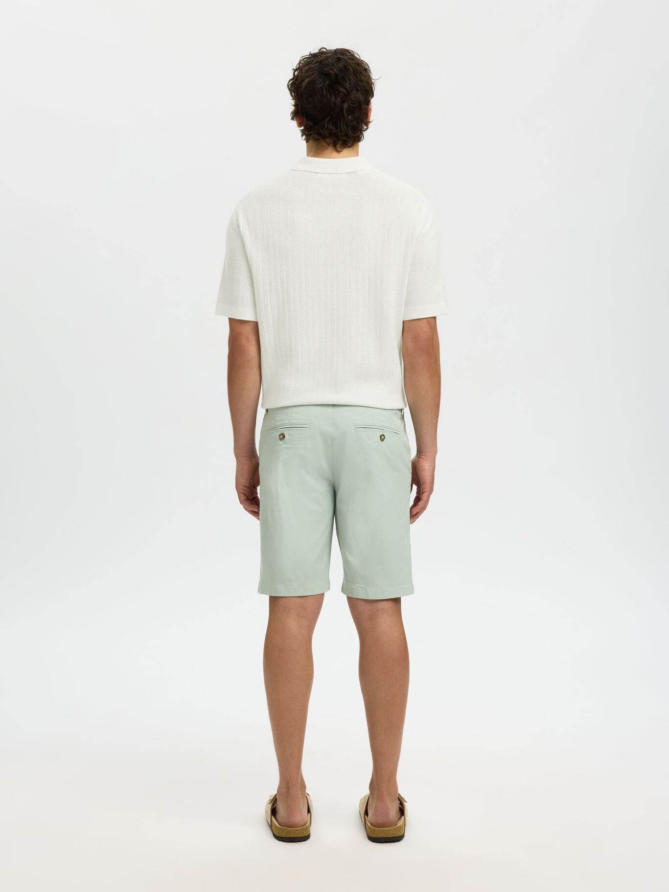 Short-sleeved knit polo shirt