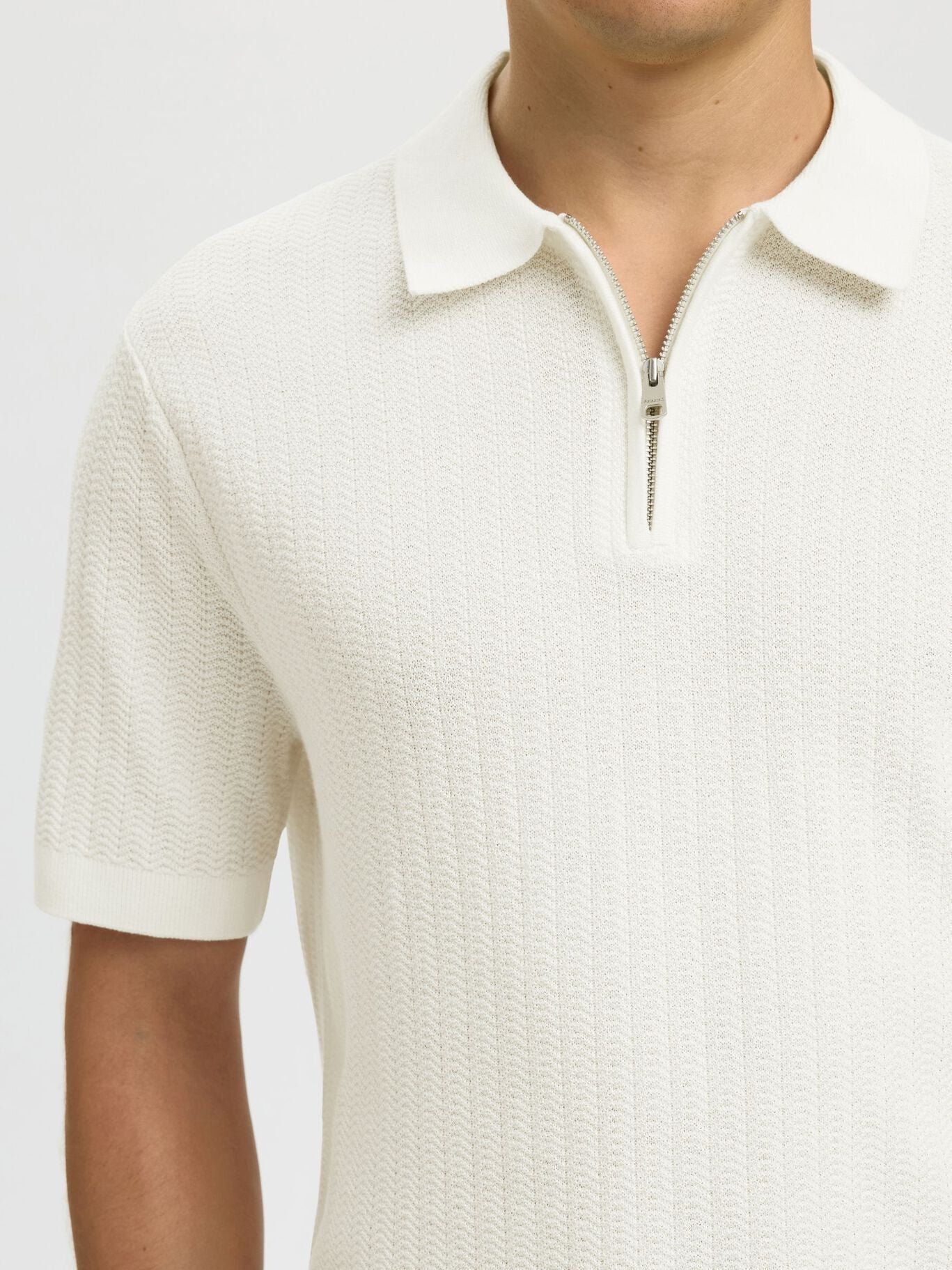 Short-sleeved knit polo shirt