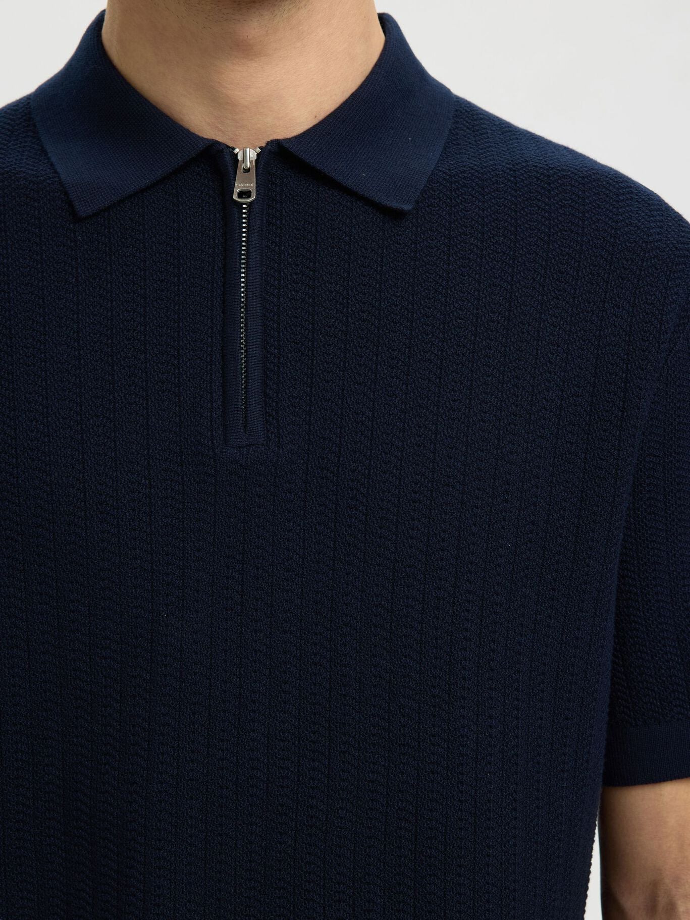 Short-sleeved knit polo shirt