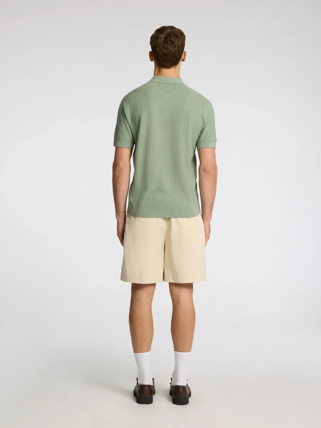 Short-sleeved knit polo shirt